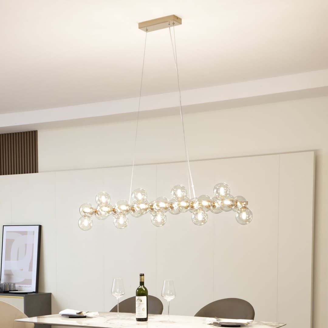 Lucande Hängeleuchte Naelen, gold/amber, 125 cm, Glas, G9 - Wohnzimmer - Modern - Metall - Mehrflammig