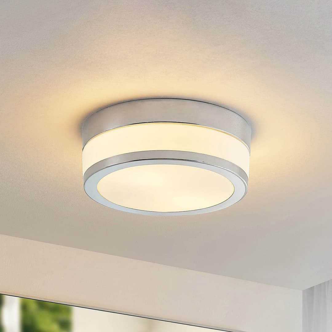 Lindby Flavi Bad-Deckenlampe, Ø 23 cm, chrom - Badezimmer - Modern - Glas - Rund